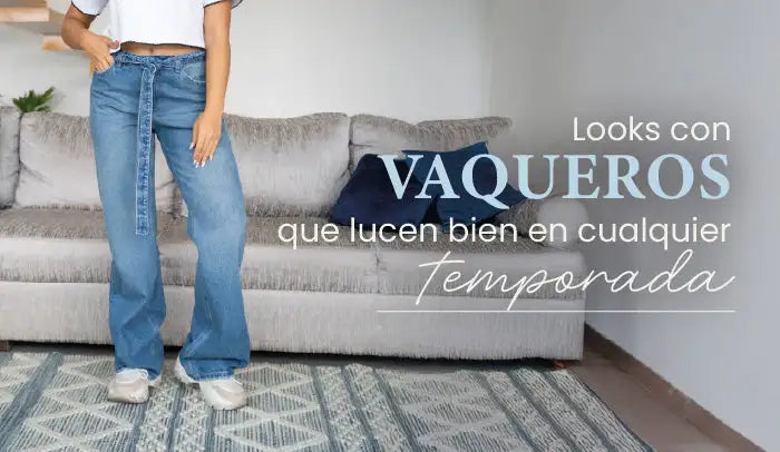 Mujer con jeans vaqueros de moda y camiseta blanca en sala moderna, outfit casual femenino